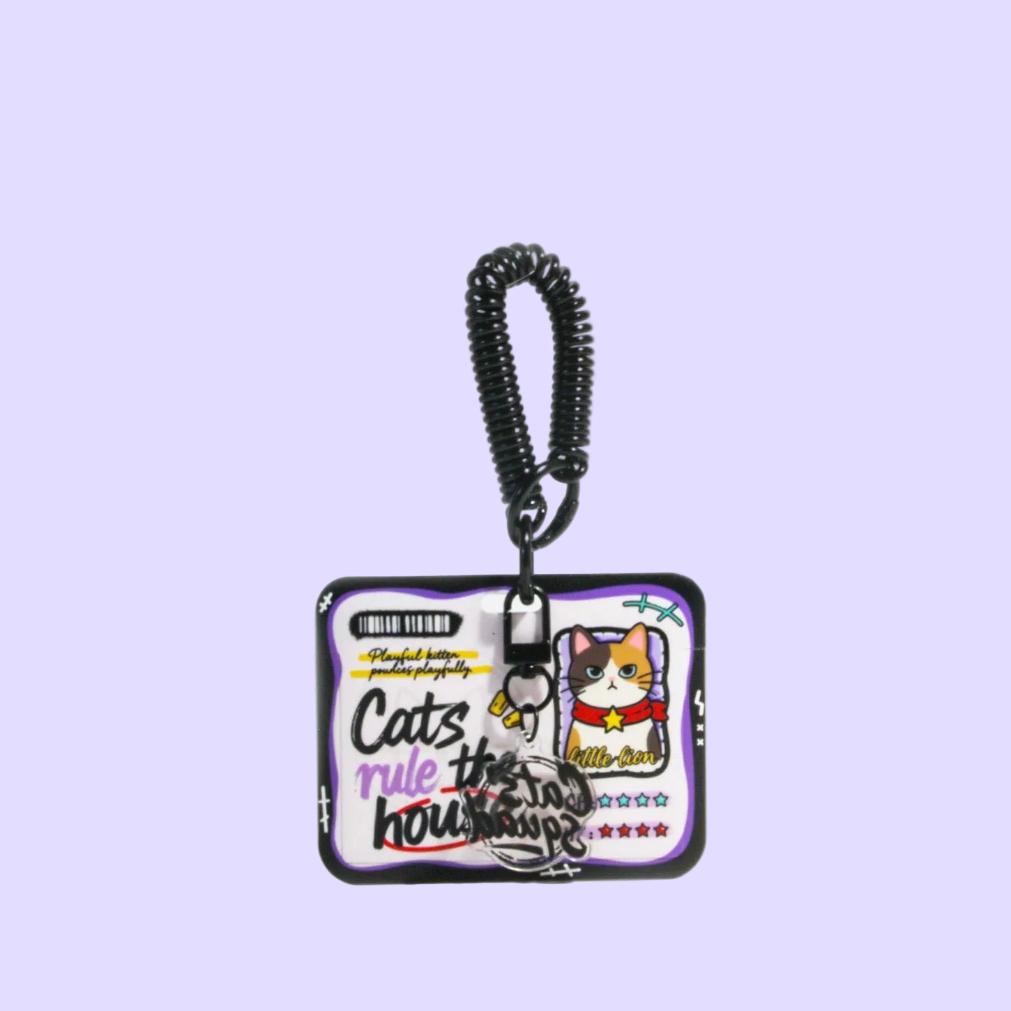 Card Holder. A square keychain or bag charm with a coiled black cord and clasp, featuring a cartoon cat and the text 'Cat's rule the house' on a white background.