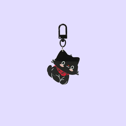 A black cat-shaped keychain charm with a red plaid scarf, attached to a black carabiner clip